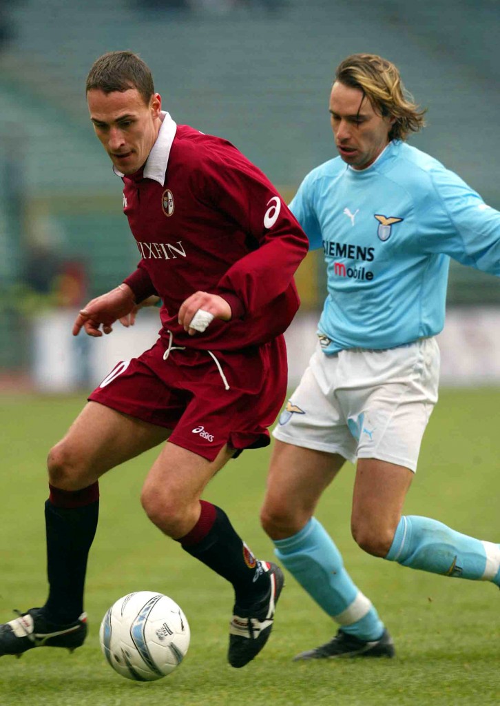 Luca Mezzano of Torino and Enrico Chiesa of Lazio in action