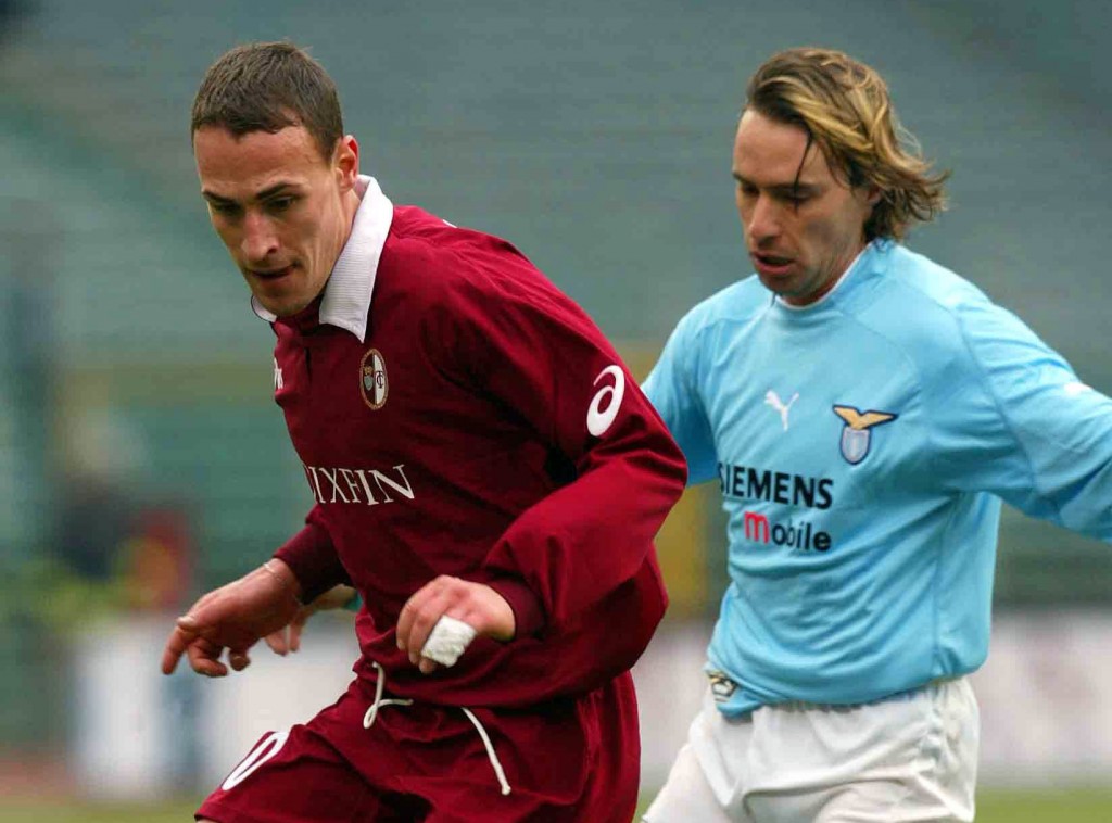Luca Mezzano of Torino and Enrico Chiesa of Lazio in action