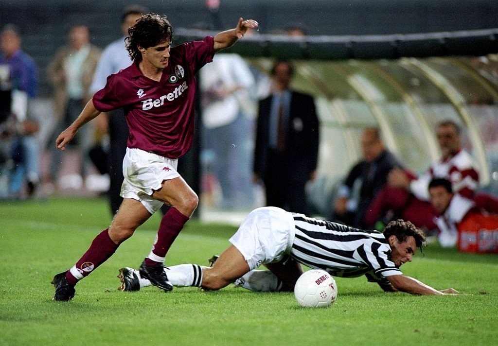 Benito Carbone of Torino and Rossini of Udinese