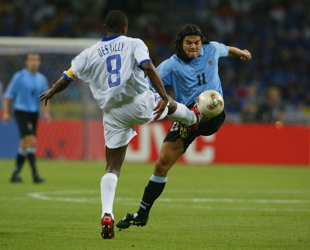 Marcel Desailly of France and Federico Magallanes of Uruguay
