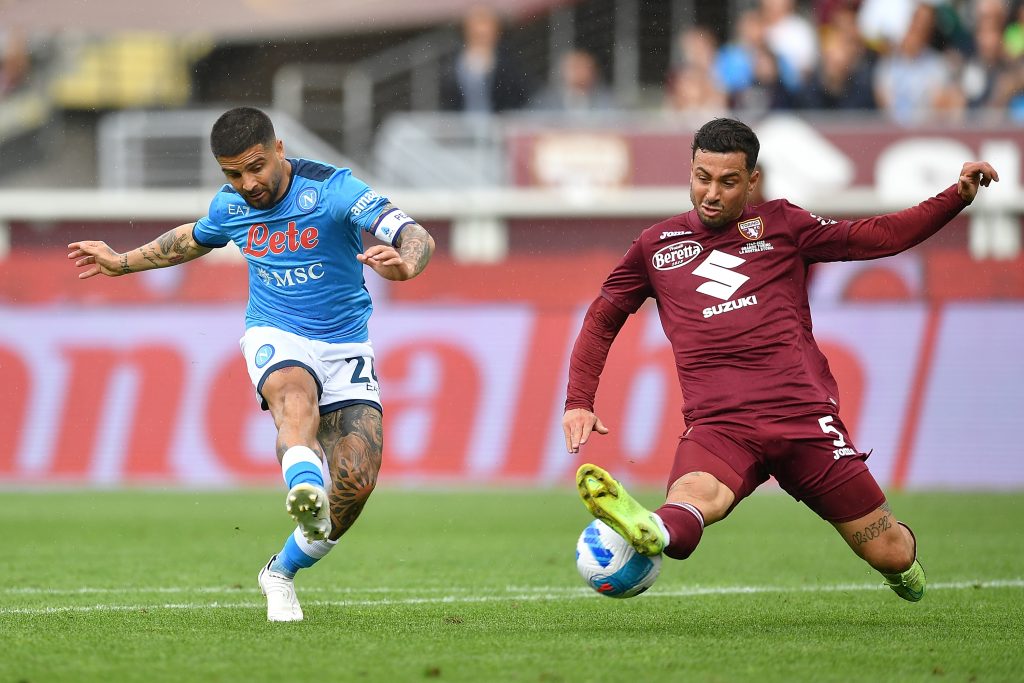 TURIN, ITALY - MAY 07: Lorenzo Insigne of SSC Napoli is challenged by Armando Izzo of Torino FC during the Serie A match between Torino FC and SSC Napoli at Stadio Olimpico di Torino on May 7, 2022 in Turin, Italy. (Photo by Valerio Pennicino/Getty Images)