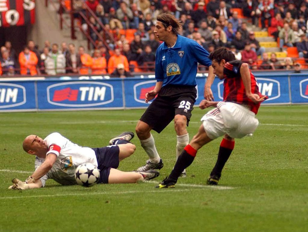 Gianluca Berti of Empoli saves from Filippo Inzaghi of AC Milan