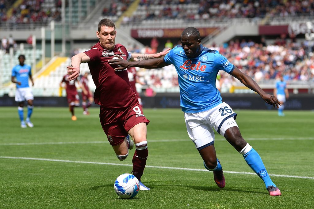 TURIN, ITALY - MAY 07: Andrea Belotti of Torino FC is challenged by Kalidou Koulibaly of SSC Napoli during the Serie A match between Torino FC and SSC Napoli at Stadio Olimpico di Torino on May 7, 2022 in Turin, Italy. (Photo by Valerio Pennicino/Getty Images)