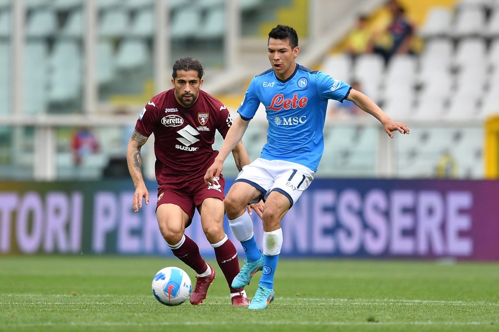 TURIN, ITALY - MAY 07: Ricardo Rodriguez of Torino FC competes with Hirving Lozano of SSC Napoli during the Serie A match between Torino FC and SSC Napoli at Stadio Olimpico di Torino on May 7, 2022 in Turin, Italy. (Photo by Valerio Pennicino/Getty Images)