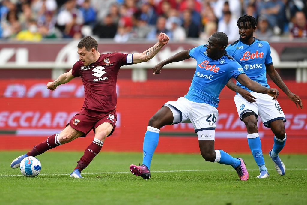 TURIN, ITALY - MAY 07: Andrea Belotti of Torino FC is challenged by Kalidou Koulibaly of SSC Napoli during the Serie A match between Torino FC and SSC Napoli at Stadio Olimpico di Torino on May 7, 2022 in Turin, Italy. (Photo by Valerio Pennicino/Getty Images)