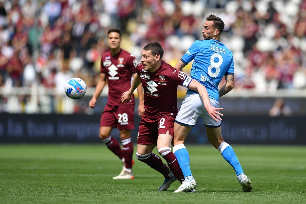 TURIN, ITALY - MAY 07: Andrea Belotti of Torino FC competes with Fabian Ruiz of SSC Napoli during the Serie A match between Torino FC and SSC Napoli at Stadio Olimpico di Torino on May 7, 2022 in Turin, Italy. (Photo by Valerio Pennicino/Getty Images)